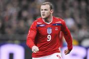 Rooney provoque le Portugal